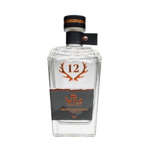 Die Klarglasflasche mit der Aufschrift Wurzelechtes Zibärtle zeigt eine orangefarbene 12 mit Geweihgrafik und ist mit einem schwarz-kupferfarbenen Deckel verschlossen.