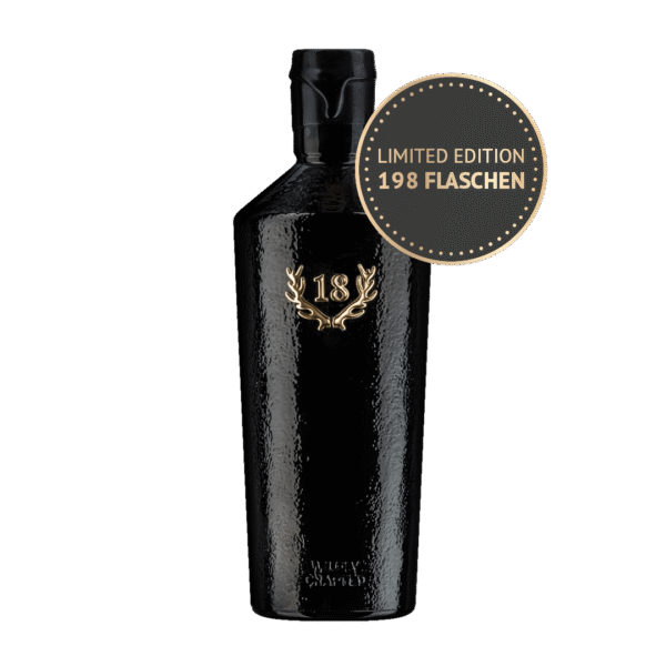 Eine schwarze Flasche 1997 Birnenbrand Palmisch im Ex-Laphroaig-Fass mit 18 und Lorbeer, die in einer limitierten Auflage von nur 198 Flaschen auf den Markt kommt.