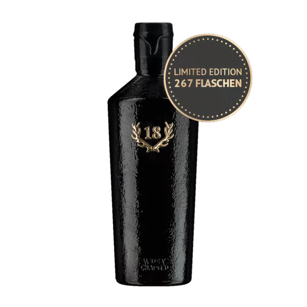 Eine limitierte Auflage 1986 Wilde Schlehe aus dem Kastanienholzfass in einer schwarzen Flasche mit "18" und Lorbeermotiv auf der Vorderseite - nur 267 Flaschen verfügbar.